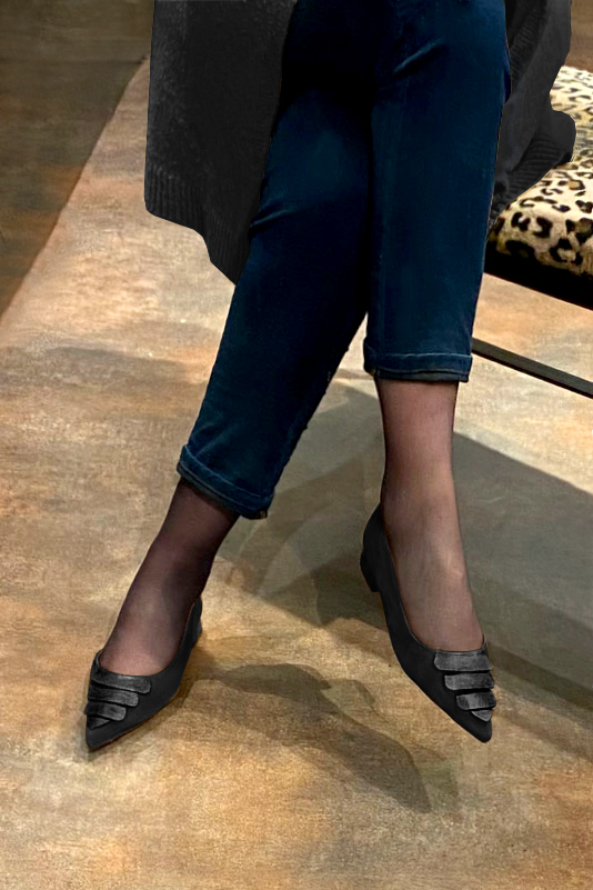 Matt black women's open arch dress pumps. Pointed toe. Flat flare heels. Worn view - Florence KOOIJMAN